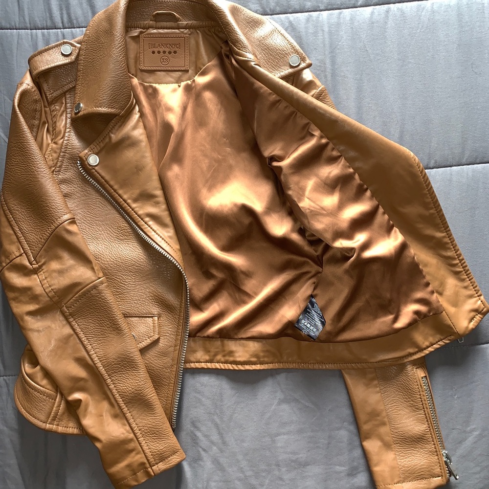Form fitting tan biker jacket. Worn once!
